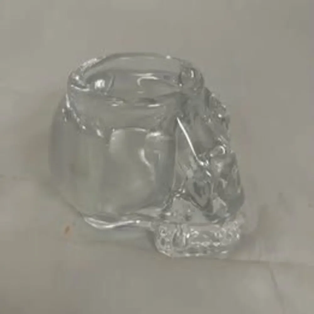 Glass skull candle holder